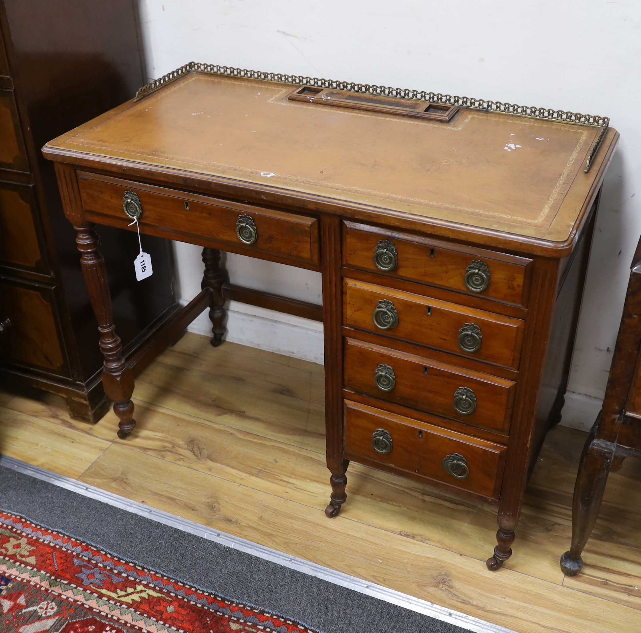 A late Victorian mahogany kneehole desk, width 98cm, depth 51cm, height 76cm